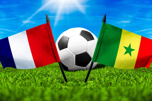 May 22, 2026: PHOTO MONTAGE, 2026 FIFA World Cup, WM, Weltmeisterschaft, Fussball National flags of France and Senegal with a soccer ball on the field. Stock image for the group stage match on June 16 at the 2026 FIFA World Cup