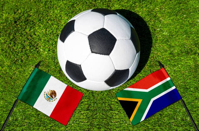 May 22, 2026: PHOTO MONTAGE, 2026 FIFA World Cup, WM, Weltmeisterschaft, Fussball National flags of Mexico and South Africa with a soccer ball on a field. Stock image for the group stage match on June 11 at the 2026 FIFA World Cup