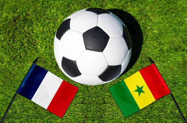 May 22, 2026: PHOTO MONTAGE, 2026 FIFA World Cup, WM, Weltmeisterschaft, Fussball National flags of France and Senegal with a soccer ball on the field. Stock image for the group stage match on June 16 at the 2026 FIFA World Cup