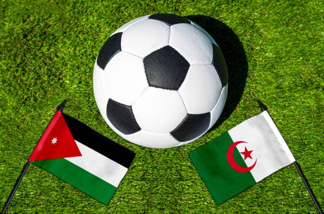 May 22, 2026: PHOTO MONTAGE, 2026 FIFA World Cup, WM, Weltmeisterschaft, Fussball National flags of Jordan and Algeria with a soccer ball on the field. Stock image for the group stage match on June 23 at the 2026 FIFA World Cup