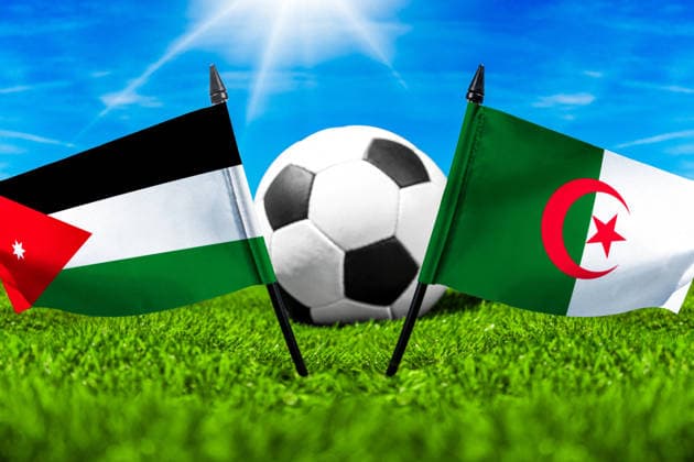 May 22, 2026: PHOTO MONTAGE, 2026 FIFA World Cup, WM, Weltmeisterschaft, Fussball National flags of Jordan and Algeria with a soccer ball on the field. Stock image for the group stage match on June 23 at the 2026 FIFA World Cup