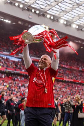 (SP) BRITAIN-LIVERPOOL-FOOTBALL-FA PREMIER LEAGUE-LIVERPOOL FC v CRYSTAL PALACE FC (250525) -- LIVERPOOL, May 25, 2025 (Xinhua) -- Liverpool s head coach Arne Slot with the Premier League trophy, as the Reds are crowned Champions for a 20th time, after the FA Premier League match between Liverpool FC and Crystal Palace FC at Anfield in Liverpool, Britain, on May 25, 2025. The game ended in a 1-1 draw.. (Xinhua) FOR EDITORIAL USE ONLY. NOT FOR SALE FOR MARKETING OR ADVERTISING CAMPAIGNS. NO USE WITH UNAUTHORIZED AUDIO, VIDEO, DATA, FIXTURE LISTS, CLUB LEAGUE LOGOS OR LIVE SERVICES. ONLINE IN-MATCH USE LIMITED TO 45 IMAGES, NO VIDEO EMULATION. NO USE IN BETTING, GAMES OR SINGLE CLUB LEAGUE PLAYER PUBLICATIONS. Copyright: xXinhuax 2025-05-25-775-Liverpool_Crystal_Palace