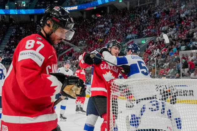 ZURICH, SWITZERLAND - MAY 30: Dylan Cozens of Canada C) against Urho Vaakanainen of Finland R) during the 2026 IIHF Ice hockey, Eishockey World Championship, WM, Weltmeisterschaft Switzerland game between Canada and Finland at Swiss Life Arena on May 30, 2026 in Zurich, Zurich. Zurich Swiss Life Arena Zurich Switzerland Copyright: xJustPictures.ch JarixPestelaccix jp-en-EuSpIm-JP6_JAR_Canada_Finland_30May2026_00213