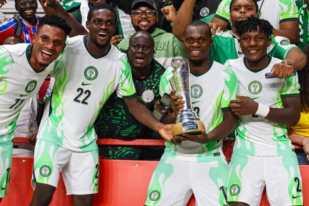 Jamaica v Nigeria, Unity Cup London 2026, Cup Final Nigeria midfielder Tosin Oyedokun (11), Nigeria defender Al-Ameen Kehinde Tijani (22), Nigeria defender Elias Ochobi (13) and Nigeria defender Chibueze Oputa (2) lifts the Unity Cup Trophy in front of the visiting fans after the Unity Cup London 2026 Final match between Jamaica and Nigeria at The Valley, London, UK on 30 May 2026. London The Valley Greater London UK Editorial use only , Copyright: xToyinxOshodix PSI-24348-0093
