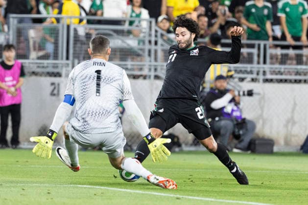May 30, 2026, Pasadena, California, USA: Australia goalkeeper Mathew Ryan (1) makes a save against MexicoÃ¢â‚¬â ¢s Cesar Huerta (21) during a MexTour Sendoff Match at Rose Bowl on Saturday, May 30, 2026 in Pasadena, Calif. MexTour Sendoff Match: Mexico 1:0 Australia  - ZUMAc68_ 20260530_zaf_c68_028 Copyright: xRingoxChiux