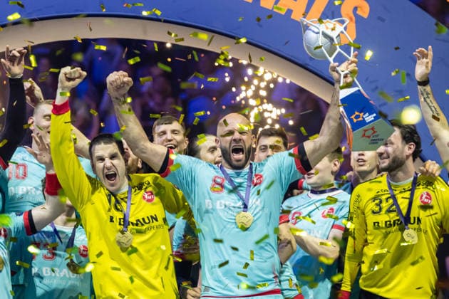 Torwart Nebojsa Simic (MT Melsungen), Adrian Sipos (MT Melsungen) und Torwart Pawel Krawczyk (MT Melsungen) with the Trophy during the handball final of the Winamax EHF Finals 2026 between THW Kiel and MT Melsungen at Barclays Arena on May 31, 2026 in Hamburg, Germany. -