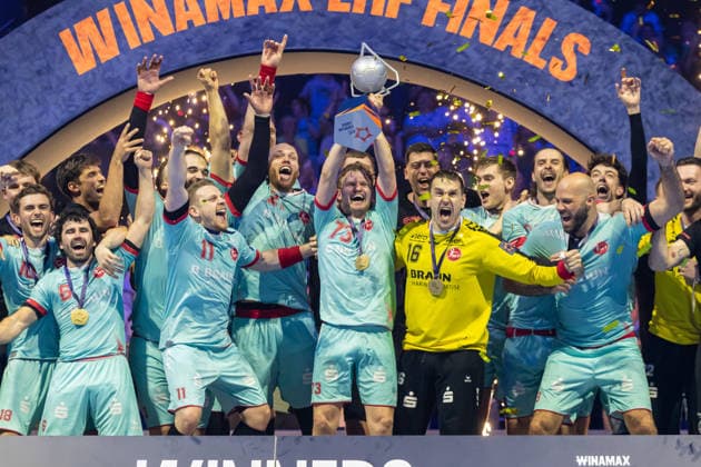 Timo Kastening (MT Melsungen) lifts the EHF-Cup at the award ceremony during the handball final of the Winamax EHF Finals 2026 between THW Kiel and MT Melsungen at Barclays Arena on May 31, 2026 in Hamburg, Germany. -