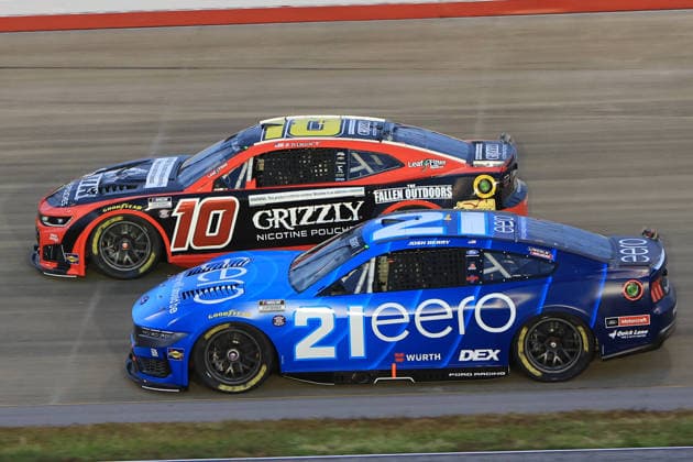 NASHVILLE, TN - MAY 31: Josh Berry ( 21 Wood Brothers Racing eero Ford) races with Ty Dillon ( 10 Kaulig Racing Grizzly Nicotine Pouches Chevrolet) into turn 3 during the running of the NASCAR, Motorsport, USA Cup Series Cracker Barrel 400 on May 31, 2026 at Nashville Superspeedway in Lebanon, TN. (Photo by Jeff Robinson Icon Sportswire) AUTO: MAY 31 NASCAR Cup Series Cracker Barrel 400 EDITORIAL USE ONLY Icon26053120619400