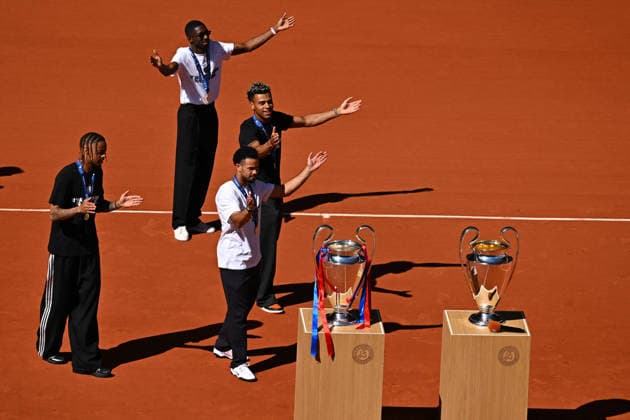 2026 French Open - PSG Players Desire DOUE of PSG, Warren ZAIRE-EMERY of PSG, Ousmane DEMBELE of PSG and Bradley BARCOLA of PSG hold the two UEFA Champions League s trophies at the 2026 Roland Garros French Tennis open tournament in Paris, France, on June 1, 2026. Photo by Corinne Dubreuil ABACAPRESS.COM Paris France  Copyright: xDubreuilxCorinne ABACAx