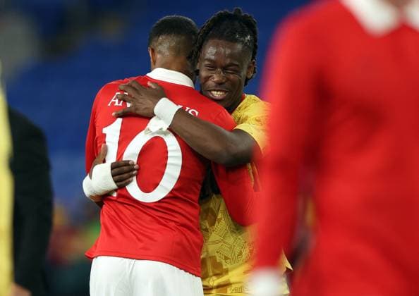 Brandon Thomas-Asante of Ghana hugs Kai Andrews of Wales at full time Wales v Ghana, International Friendly, Länderspiel, Nationalmannschaft Football, Cardiff City Stadium, Cardiff, Wales, UK - 02 Jun 2026Cardiff Cardiff City Stadium United Kingdom EDITORIAL USE ONLY No use with unauthorised audio, video, data, fixture lists, club league logos or live services. Online in-match use limited to 120 images, no video emulation. No use in betting, games or single club league player publications. Copyright: xKieranxMcManus Shutterstockx 16906575bj