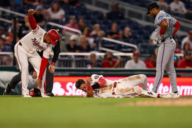 June 2, 2026, Washington D.C, District Of Columbia, United States: Washington, DC; Washington Nationals catcher Drew Millas (14) is injured as he slid into third base during the Major League Baseball game between the Washington Nationals and the Miami Marlins at Nationals Park on Tuesday, June 2, 2026. The Marlins beat the Nationals 7-3. Washington D.C United States - ZUMAp258 20260602_znp_p258_071 Copyright: xStevexPrakopex