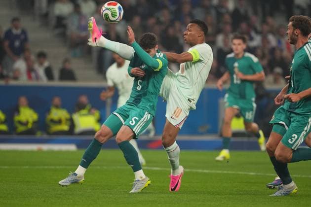 Kylian Mbappe of France and Trai Hume of Northern Ireland France v Northern Ireland, International Friendly, Länderspiel, Nationalmannschaft Football, Decathlon Arena Stade Pierre-Mauroy, Lille, France - 08 Jun 2026Lille Decathlon Arena Stade Pierre-Mau France EDITORIAL USE ONLY No use with unauthorised audio, video, data, fixture lists, club league logos or live services. Online in-match use limited to 120 images, no video emulation. No use in betting, games or single club league player publications. Copyright: xDavexWinter Shutterstockx 16912920z
