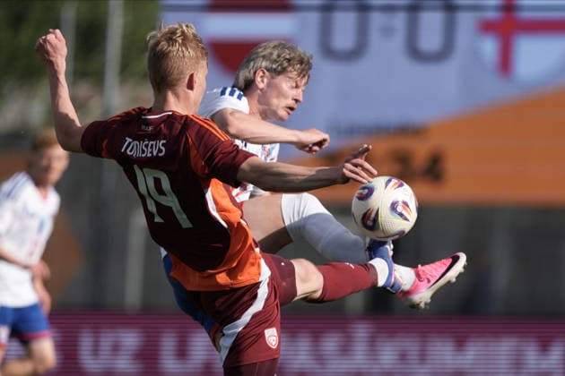 Latvia Faroe Islands Soccer, RÄ«ga, Latvia, 09.06.2026 Adrian Justinussen and Maksims Tonisevs in action during Baltic Cup game between Latvia and Faroe Islands national teams In Riga, Latvia, 09.06.2026. Photo: Roman Koksarov (RKF) RÄ«ga Latvia Copyright: xRomanxKoksarovx DSC00576.JPG