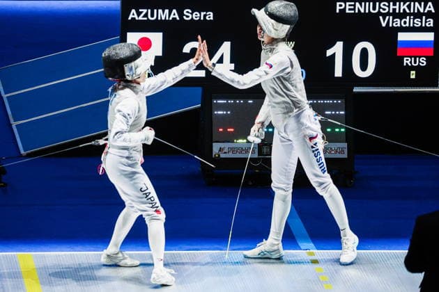CHINA, HONG KONG - JULY 30, 2026: Athletes Vladislava Peniushkina (R) of Russia and Sera Azuma of Japan high-five in their team foil bout during the 2026 Kerry Fencing World Championships 2026 Fencing World Championships In Hong Kong  - ZUMAt113 20260730_zaa_t113_065 Copyright: xMikhailxSinitsynx