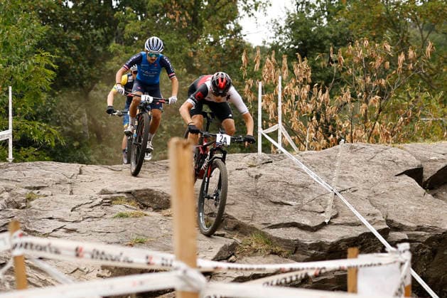 31.07.2026, Monteceneri, Monte Ceneri, 2026 UEC MTB European Championship, EM, Europameisterschaft XCR Team Relay s Final (cross country team relay) Nicolas Halter 2A (SUI, U23 Men) and Filippo Fontana 1A (ITA, Elite Men) in front of the race Monteceneri Monte Ceneri Ticino Switzerland Copyright: xJustPictures.ch FrancescoxMinghettix jp-en-FrMi-_NG_0008