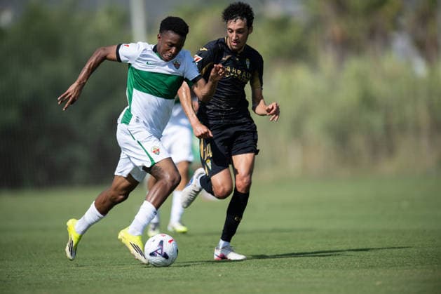 Buba Sangare of Elche and Adnane Ghailan of Cordoba during preseason friendly match between Elche CF v Cordoba CF played at Oliva, Valencia on July 31, 2026 in Spain Oliva Valenci Spain Copyright: xVicentexVidalx xAgenciaxLOFx
