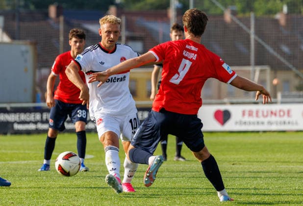 31.07.2026 - Fussball - Saison 2026 2027 - Regionalliga Bayern - 02. Spieltag: 1. FC Nürnberg FCN II ( Club ) - SpVgg Unterhaching - DaMa - xdaxmax - Benedikt Kirsch (10, 1. FC Nürnberg FCN II ) Jeroen Krupa (9, SpVgg Unterhaching )