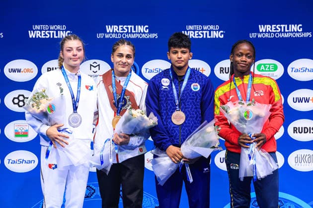 U17, U 17 Wrestling World Championships Podium 61kg WW - Gold: Ozdenur Ozmez (TUR), Silver: Landri Paige Von Gonten (USA), Bronze: Graciela Gaudencia Eningo Asama (ESP), Avanshika Avanshika (IND) Copyright: xUnitedxWorldxWrestlingx xAmirrezx UWW-U17-WC-BAKU-2026