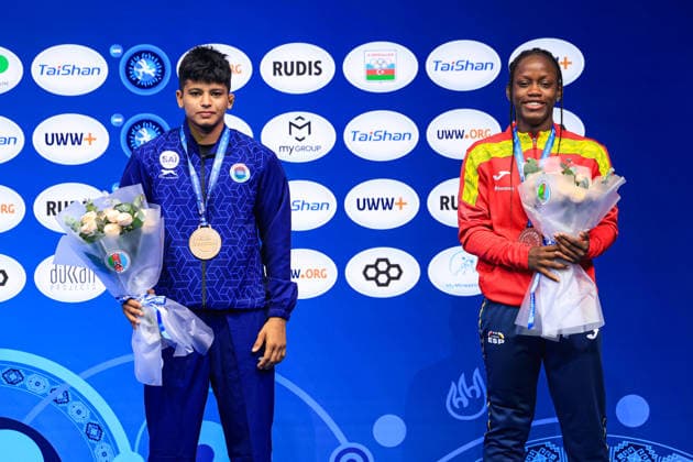 U17, U 17 Wrestling World Championships Podium 61kg WW - Bronze: Graciela Gaudencia Eningo Asama (ESP), Avanshika Avanshika (IND) Copyright: xUnitedxWorldxWrestlingx xAmirrezx UWW-U17-WC-BAKU-2026