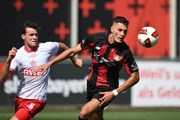 Patrik SCHICK (LEV) gegen Ahmet ARSLAN (RWE) Aktion, Zweikampf, Fussball 1. Bundesliga, Testspiel, testmatch, friendly match, Freundschaftsspiel, Bayer Leverkusen (LEV) - Rot Weiss Essen am 01.08.2026 in Leverkusen Deutschland. DFL regulations prohibit any use of photographs as image sequences and or quasi-video Â