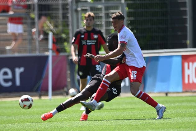 Victor BONIFACE (LEV) gegen Luca BAZZOLI (RWE) Aktion, Zweikampf, Fussball 1. Bundesliga, Testspiel, testmatch, friendly match, Freundschaftsspiel, Bayer Leverkusen (LEV) - Rot Weiss Essen 3-0, am 01.08.2026 in Leverkusen Deutschland. DFL regulations prohibit any use of photographs as image sequences and or quasi-video Â