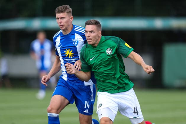 01.08.2026, Fussball, Herren, Regionalliga Nord, 1. Spieltag, HSC Hannover - BSV Kickers Emden Luc Ihorst (blau 14 BSV Kickers Emden) im Zweikampf mit Fabian Weigel (4 HSC Hannover)