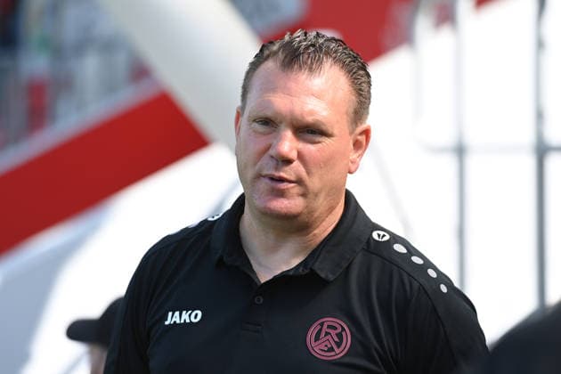 Trainer Uwe KOSCHINAT (RWE) Portraet, Porträt, Portrait, Angeschnittenes Einzelbild, Einzelmotiv, Fussball 1. Bundesliga, Testspiel, testmatch, friendly match, Freundschaftsspiel, Bayer Leverkusen (LEV) - Rot Weiss Essen am 01.08.2026 in Leverkusen Deutschland. DFL regulations prohibit any use of photographs as image sequences and or quasi-video Â
