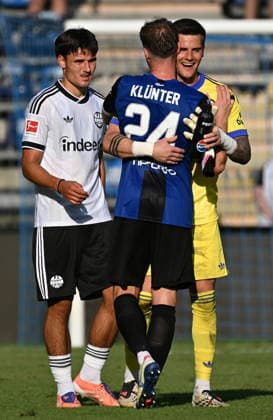 01.08.2026, xjhx, Fussball Testspiel, SV Waldhof Mannheim - Eintracht Frankfurt v.l. Niklas Scheller (Eintracht Frankfurt), Michael Zetterer (Eintracht Frankfurt), Lukas Kluenter Klünter (Waldhof Mannheim) Mannheim