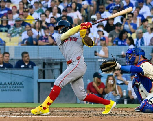 Boston Red Sox center fielder Ceddanne Rafaela hits a solo home run against Los Angeles Dodger starting pitcher Yoshinobu Yamamoto in the third inning at Dodger Stadium in Los Angeles on Saturday, August 1, 2026.  LAP2026080101 JIMxRUYMEN