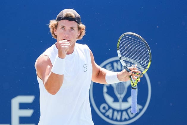 MONTREAL, QC - AUGUST 04: Liam Draxl (CAN) reacts after scoring a point during a first round match at National Bank Open on August 04, 2026 at IGA Stadium in Montreal, QC (Photo by David Kirouac Icon Sportswire) TENNIS: AUG 04 National Bank Open EDITORIAL USE ONLY Icon26080405026