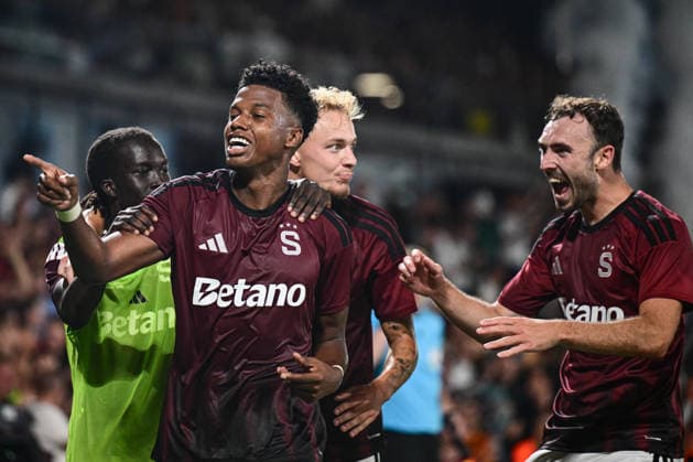 From left John Mercado and Andrew Irving of Sparta celebrate a goal during the 1st leg, 3rd qualifying round match of the Football Champions League between Sparta Praha and Olympique Lyon, on August 4, 2026, in Prague, Czech Republic. (CTKxPhoto OndrejxDeml) CTKPhotoP2026080407049  CTKPhotoP2026080407049