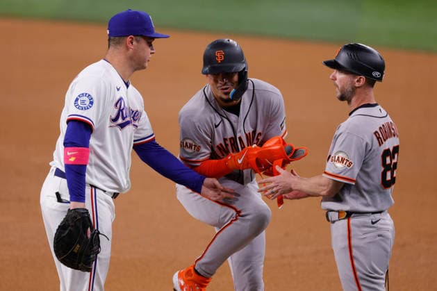August 4, 2026, Arlington, Texas, USA: Texas Rangers first baseman JOC PEDERSON (3) and San Francisco Giants shortstop WILLY ADAMES (2) in a baseball game, Tuesday, Aug. 4, 2026, in Arlington, Texas. MLB, Baseball Herren, USA 2026 - Giants4:5Rangers - ZUMAa325 20260804_zsa_a325_035 Copyright: xDavidxBalleringxIix