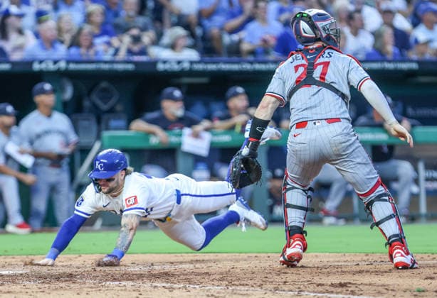 AUG 04, 2026: Kansas City Royals catcher Carter Jensen (22) dives and scores at home plate against the Minnesota Twins at Kauffman Stadium Kansas City, MO. CSM MLB, Baseball Herren, USA 2026: Twins Vs Royals August 4th  - ZUMAc04_ 20260804_zma_c04_022 Copyright: xRomanxPunox