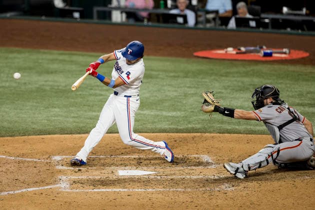 August 5, 2026, Arlington, Texas, USA: Texas Rangers shortstop NICKY LOPEZ (33) hits a single against the San Francisco Giants at Globe Life Field. Rangers win 6-0. Arlington USA - ZUMAf180 20260805_zsp_f180_001 Copyright: xMarkxFannx