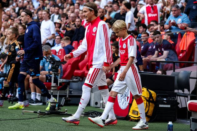 AMSTERDAM, NETHERLANDS - AUGUST 6: Mika Godts of AFC Ajax walks out prior to the UEFA Conference League 2026 27 third qualifying round first leg match between AFC Ajax and Shelbourne FC at the Johan Cruijff Arena on August 6, 2026 in Amsterdam, Netherlands.  Copyright: xRenexNijhuis MBxMediax