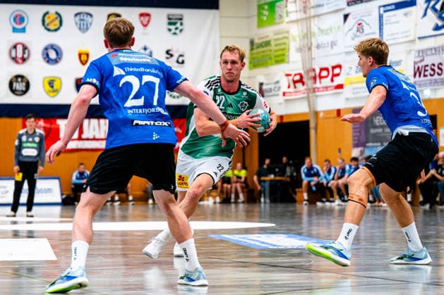 07.08.2026, xdobgx, Handball Heide-Cup 2026, TSV Hannover-Burgdorf - Mors Thy Handball v.l. Simon Skovhus Jensen (Mors-Thy Handbold, 27), Marian Michalczik (TSV Hannover-Burgdorf, 22) am Ball, plays the ball, Silas Overby (Mors-Thy Handbold, 36)