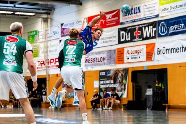 07.08.2026, xdobgx, Handball Heide-Cup 2026, TSV Hannover-Burgdorf - Mors Thy Handball v.l. Justus Fischer (TSV Hannover-Burgdorf, 54), Marian Michalczik (TSV Hannover-Burgdorf, 22), Simon Skovhus Jensen (Mors-Thy Handbold, 27)