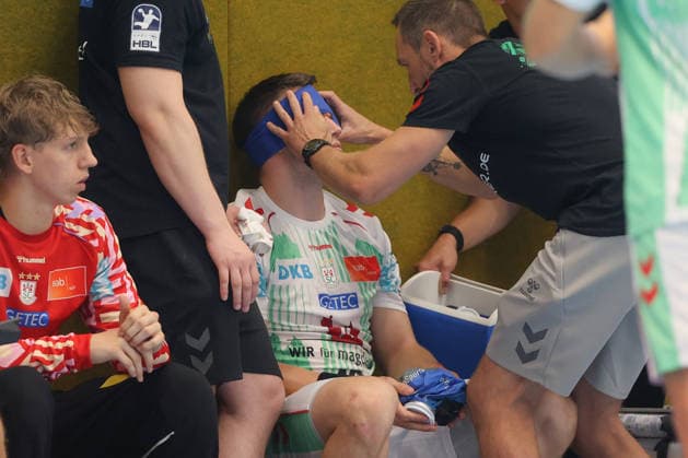 07.08.2026, xtgx, Handball Turnier, EHV Aue - SC Magdeburg emspor, v.l. Elvar Orn Jonsson (Magdeburg, 19) verletzt, Verletzung, Auge Lößnitz