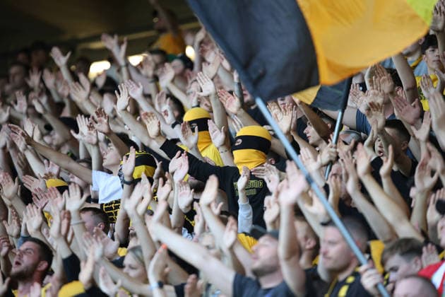 07.08.2026, xsefx, Fußball, Borussia Dortmund II (U23) - 1. FC Köln II U21, U 21 , Regionalliga West, Stadion Rote Erde, 2. Spieltag, Saison 2026 2027: BVB Fanblock mit Ultras und Bengalos DFB regulations prohibit any use of photographs as image sequences and or quasi-video. Nordrhein-Westfalen Deutschland