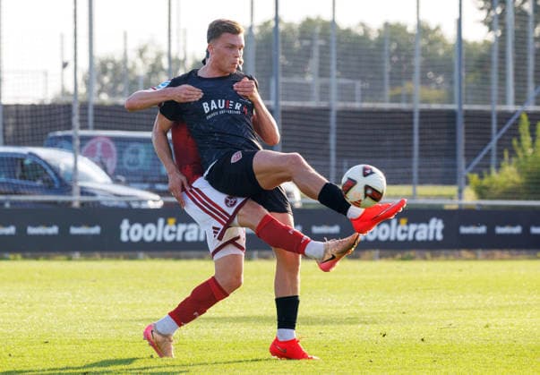 07.08.2026 - Fussball - Saison 2026 2027 - Regionalliga Bayern - 03. Spieltag: 1. FC Nürnberg FCN II ( Club ) - TSV Buchbach - DaMa - xdaxmax - Fabian Menig (5, 1. FC Nürnberg FCN II ) Tobias Stoßberger Stossberger (11, TSV Buchbach )
