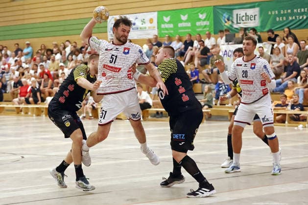 07.08.2026, xovx, Handball Lindencup, TV Hüttenberg - HSC 2000 Coburg v.l. Leonards Valkovskis (HSC Coburg), Hendrik Schreiber (TV Hüttenberg), Nils Röller (HSC Coburg), Jannes Krone (HSC Coburg), Leif Haack (TV Hüttenberg) Linden Stadthalle Hessen Deutschland (DE)