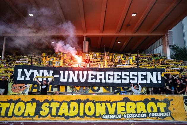 Regionalliga West: Borussia Dortmund II - 1.FC Köln II, 07.08.2026 Fans von Borussia Dortmund U23 mit dem Banner. Schriftzug lautet Lynn-unvergessen Regionalliga West: Borussia Dortmund II - 1.FC Köln II, Rote Erde, Dortmund; 07.08.2026 DFB regulations prohibit any use of photographs as image sequences and or quasi video. Copyright: xBEAUTIFULxSPORTS Buriakovx