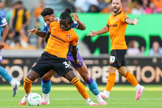 Wolverhampton Wanderers v Port Vale - Carabao Cup First Round Mateus Mane of Wolverhampton Wanderers shields the ball from a defender during the Carabao Cup First Round match between Wolverhampton Wanderers and Port Vale at Molineux in Wolverhampton, United Kingdom. Wolverhampton West Midlands United Kingdom  Copyright: xMIxNewsx originalFilename:fletcher-wolverha260807_npORz
