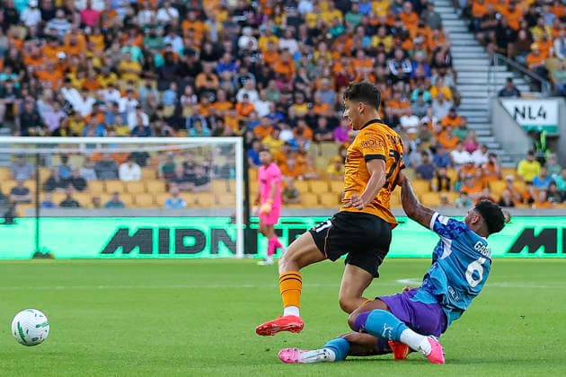 Wolverhampton Wanderers v Port Vale - Carabao Cup First Round Rodrigo Gomes of Wolverhampton Wanderers is challenged by Jordan Gabriel of Port Vale FC during the Carabao Cup First Round match between Wolverhampton Wanderers and Port Vale at Molineux, Wolverhampton. Wolverhampton West Midlands United Kingdom  Copyright: xMIxNewsx originalFilename:fletcher-wolverha260807_npSrb