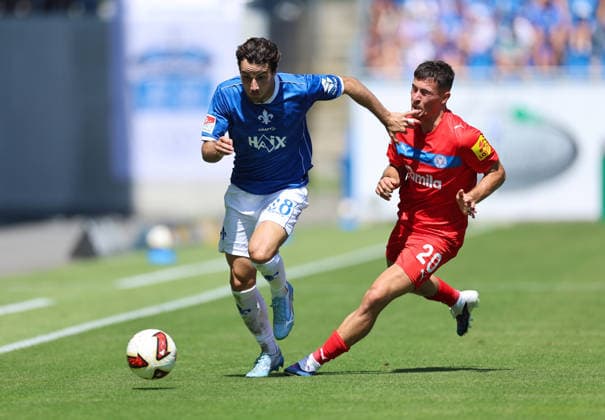 08.08.2026, Fussball 2. Bundesliga, SV Darmstadt 98 - Holstein Kiel, v.l., Christopher Lannert (SV Darmstadt 98), Adrian Kapralik (Holstein Kiel) DFL DFB REGULATIONS PROHIBIT ANY USE OF PHOTOGRAPHS AS IMAGE SEQUENCES AND OR QUASI-VIDEO. xdcx Copyright: HMBxMedia Claus
