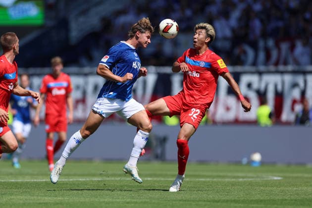 08.08.2026, Fussball 2. Bundesliga, SV Darmstadt 98 - Holstein Kiel, v.l., Fynn Lakenmacher (SV Darmstadt 98), Hiroki Sekine (Holstein Kiel) DFL DFB REGULATIONS PROHIBIT ANY USE OF PHOTOGRAPHS AS IMAGE SEQUENCES AND OR QUASI-VIDEO. xdcx Copyright: HMBxMedia Claus