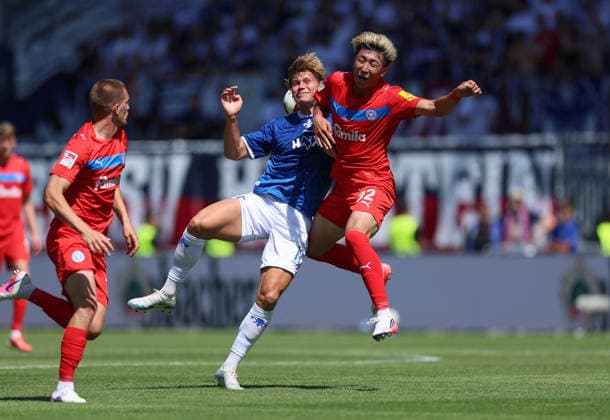 08.08.2026, Fussball 2. Bundesliga, SV Darmstadt 98 - Holstein Kiel, v.l., Fynn Lakenmacher (SV Darmstadt 98), Hiroki Sekine (Holstein Kiel) DFL DFB REGULATIONS PROHIBIT ANY USE OF PHOTOGRAPHS AS IMAGE SEQUENCES AND OR QUASI-VIDEO. xdcx Copyright: HMBxMedia Claus