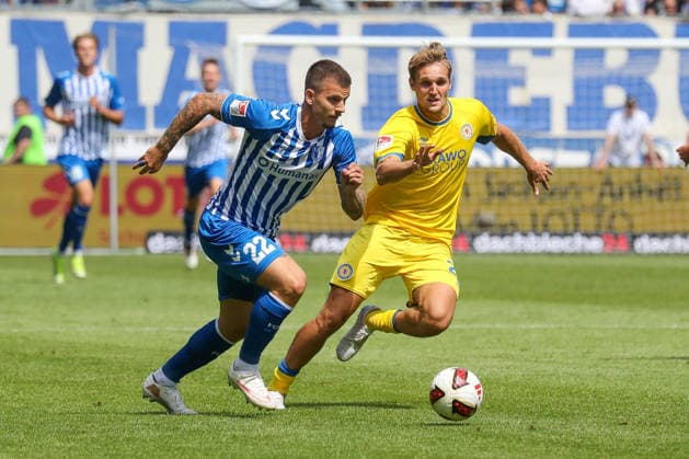 08.08.2026, xgox, Fussball - 2.Bundesliga 1.FC Magdeburg - Eintracht Braunschweig emspor, v.l. Mateusz Zukowski (Magdeburg, 22), Lukas Frenkert (Braunschweig, 29) Zweikampf, Duell, Kampf, tackle (DFL DFB REGULATIONS PROHIBIT ANY USE OF PHOTOGRAPHS as IMAGE SEQUENCES and or QUASI-VIDEO) Magdeburg