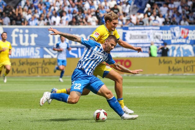 08.08.2026, xgox, Fussball - 2.Bundesliga 1.FC Magdeburg - Eintracht Braunschweig emspor, v.l. Mateusz Zukowski (Magdeburg, 22), Lukas Frenkert (Braunschweig, 29) Zweikampf, Duell, Kampf, tackle (DFL DFB REGULATIONS PROHIBIT ANY USE OF PHOTOGRAPHS as IMAGE SEQUENCES and or QUASI-VIDEO) Magdeburg