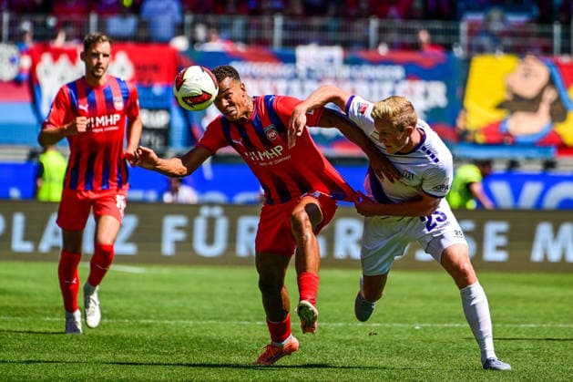 08.08.2026, GER, Fußball, Herren, 2. Bundesliga, 1. FC Heidenheim vs VfL Osnabrück Marcel Costly (Heidenheim, 24) setzt sich gegen Niklas Wiemann (Osnabrück, 25) durch Heidenheim Voith-Arena Baden-Württemberg Deutschland Copyright: xNordphotox xHafnerx